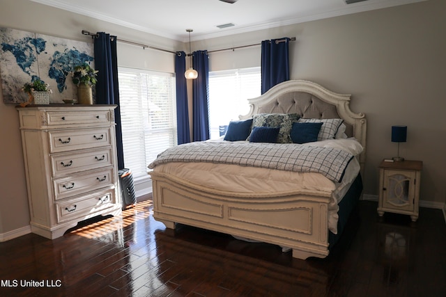 bedroom featuring dark hardwood / wood-style flooring and ornamental molding