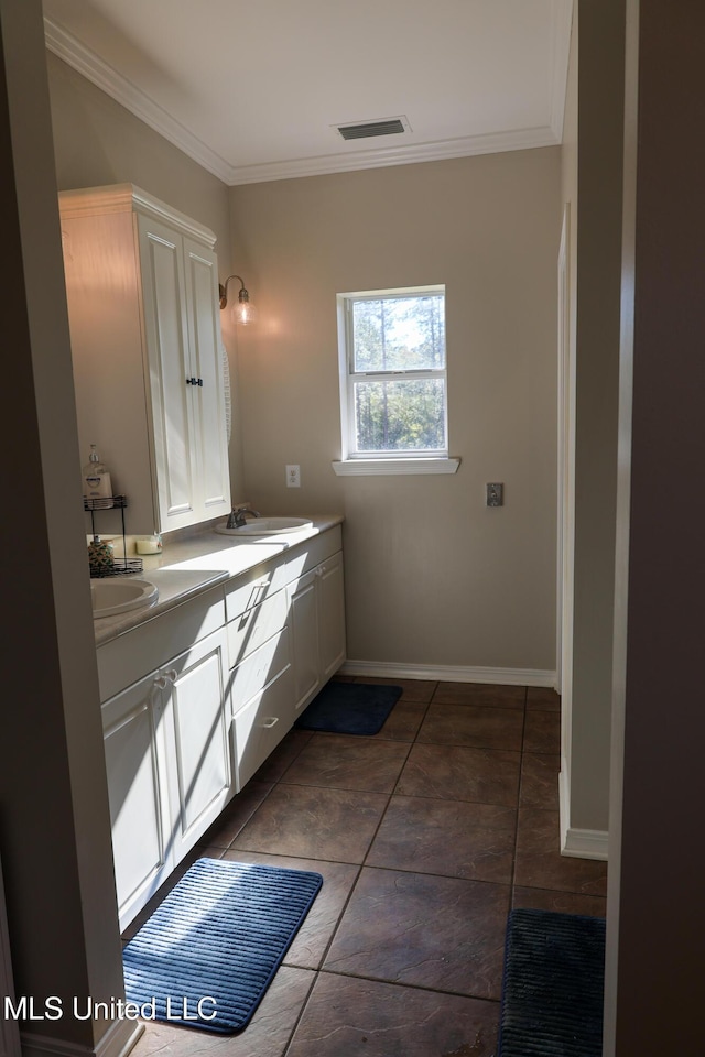 bathroom featuring tile patterned floors, vanity, and ornamental molding