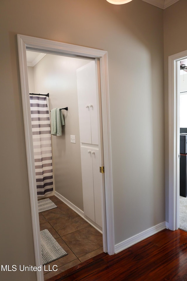 hall featuring dark wood-type flooring