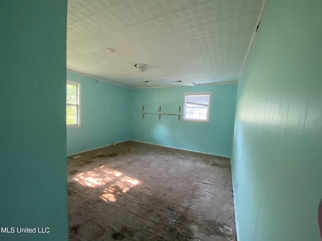 410 N Brooks St, Pelahatchie, MS 39145 - empty room featuring healthy amount of natural light