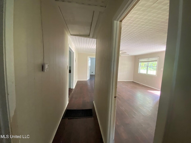 410 N Brooks St, Pelahatchie, MS 39145 - corridor featuring attic access and dark wood-style flooring