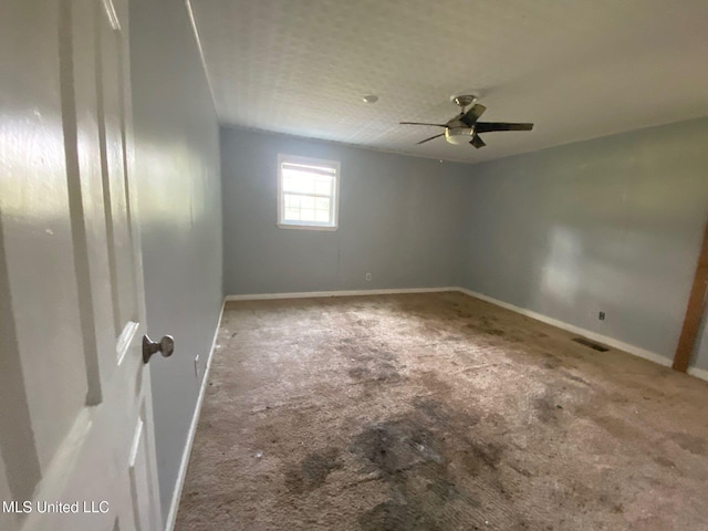 410 N Brooks St, Pelahatchie, MS 39145 - carpeted empty room with baseboards and ceiling fan