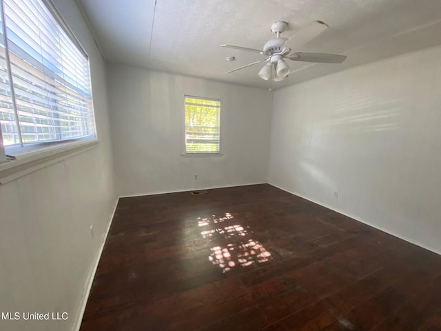 410 N Brooks St, Pelahatchie, MS 39145 - empty room with wood-type flooring and ceiling fan