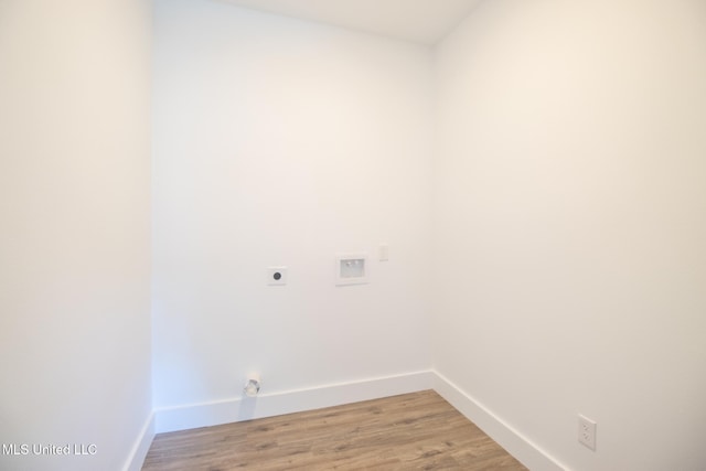 washroom featuring wood-type flooring, hookup for a washing machine, and electric dryer hookup