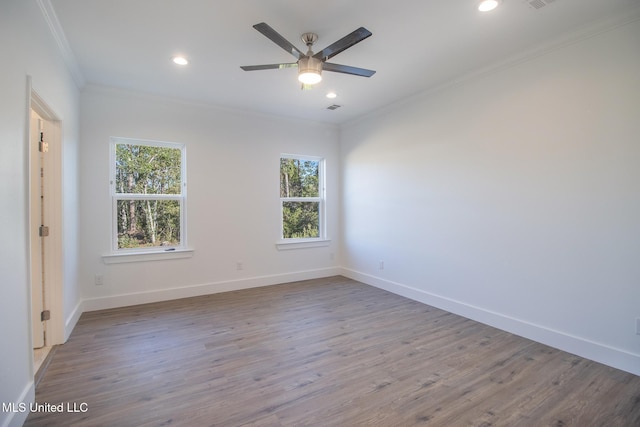 unfurnished room with light hardwood / wood-style flooring, ceiling fan, and ornamental molding