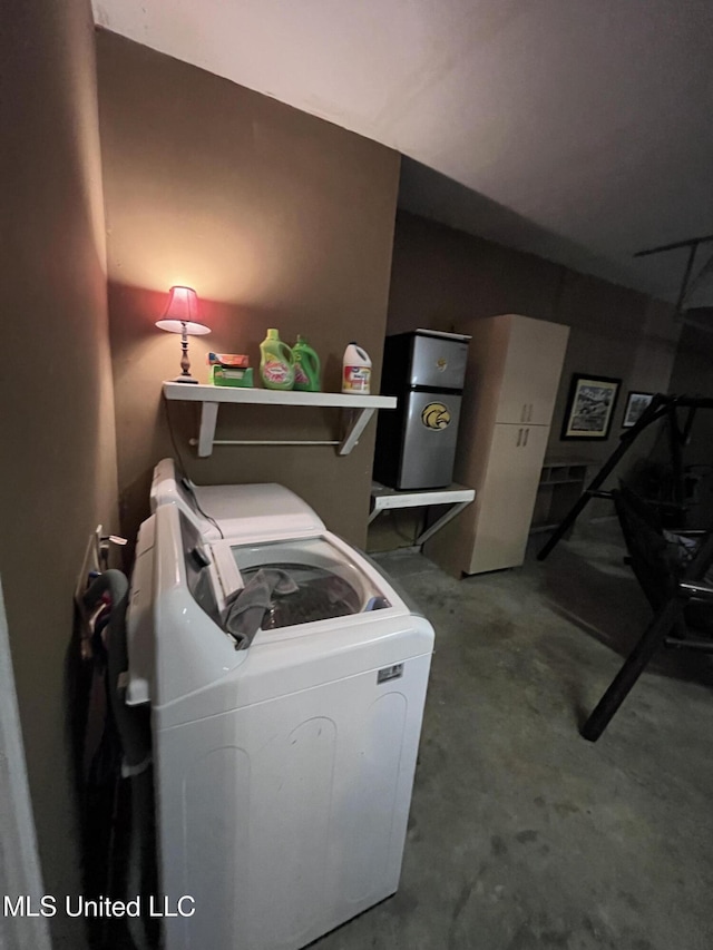 clothes washing area featuring laundry area and independent washer and dryer