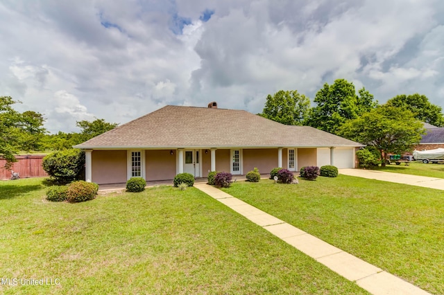 view of front of house with covered porch, a garage, stucco siding, concrete driveway, and a front lawn