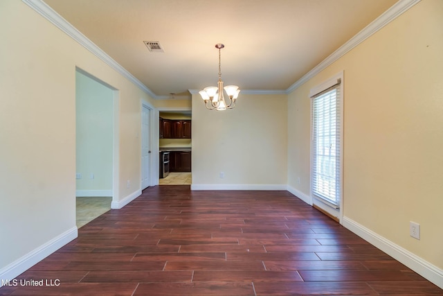 unfurnished dining area with ornamental molding, a notable chandelier, and wood finished floors