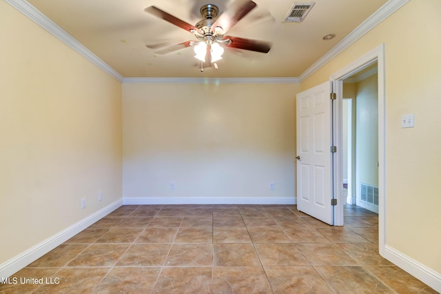 spare room with ceiling fan, ornamental molding, light tile patterned floors, and visible vents