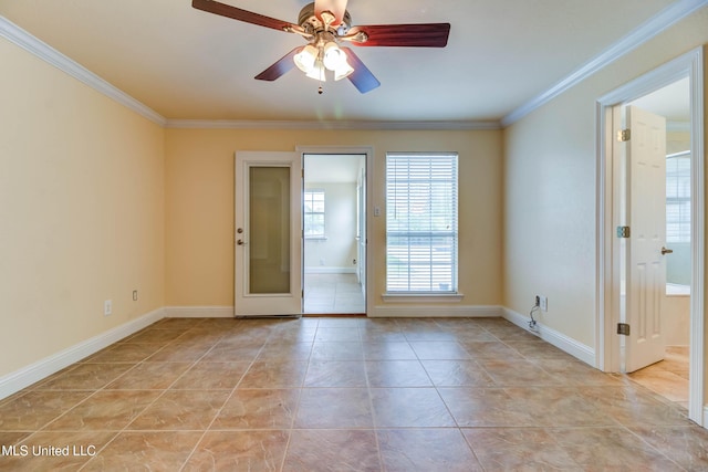 unfurnished room featuring ornamental molding, light tile patterned flooring, baseboards, and a ceiling fan