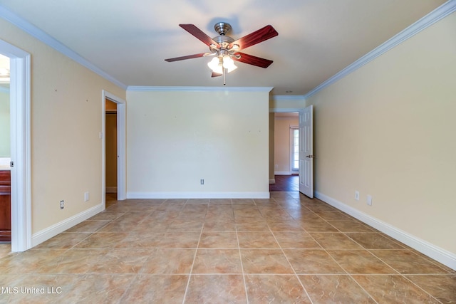 unfurnished room featuring a ceiling fan, baseboards, crown molding, and light tile patterned flooring