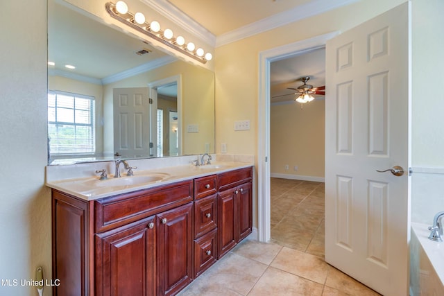 full bath featuring tile patterned flooring, crown molding, and a sink