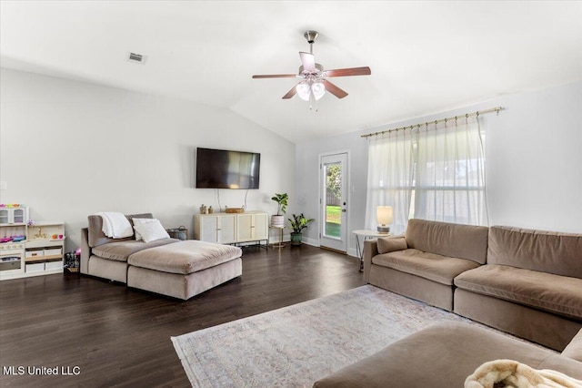 living room with vaulted ceiling, ceiling fan, and dark hardwood / wood-style floors