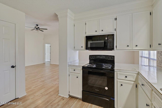 kitchen with white cabinetry, black appliances, light wood-style flooring, a textured ceiling, and a ceiling fan