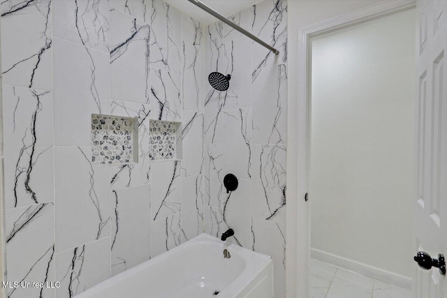 bathroom featuring shower / bathing tub combination and marble finish floor