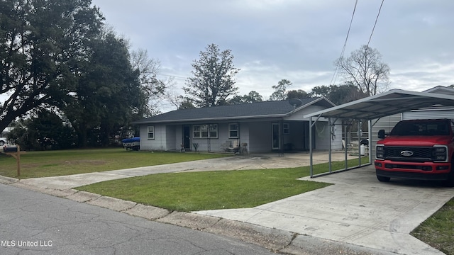 ranch-style house featuring a carport, a front yard, and concrete driveway