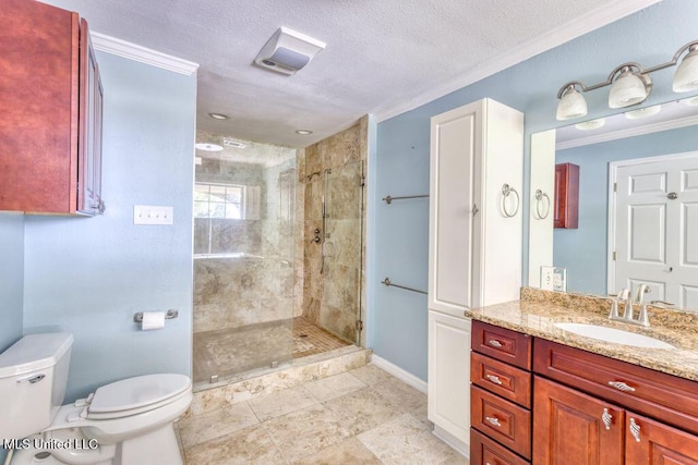 bathroom featuring vanity, toilet, a shower with shower door, and a textured ceiling