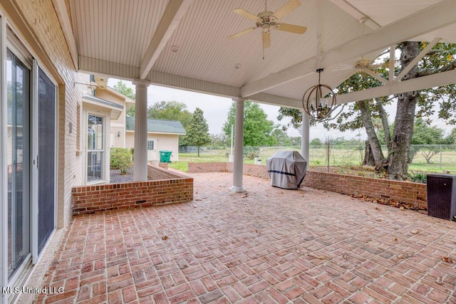 view of patio / terrace with ceiling fan and a grill