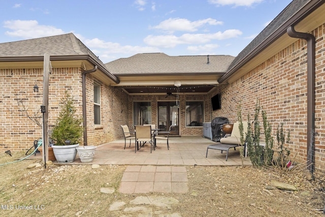 view of patio featuring a grill and ceiling fan