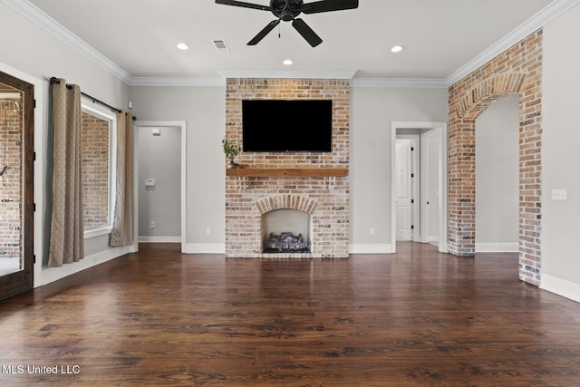 unfurnished living room with visible vents, ornamental molding, ceiling fan, and wood finished floors