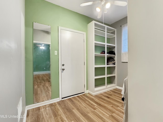 interior space featuring ceiling fan and light wood-type flooring