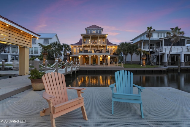 dock area with a water view