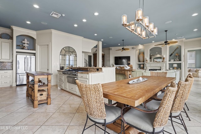 dining area with ceiling fan, crown molding, recessed lighting, a fireplace, and light tile patterned floors