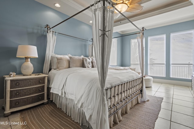 bedroom with ornamental molding, a tray ceiling, tile patterned flooring, recessed lighting, and ceiling fan