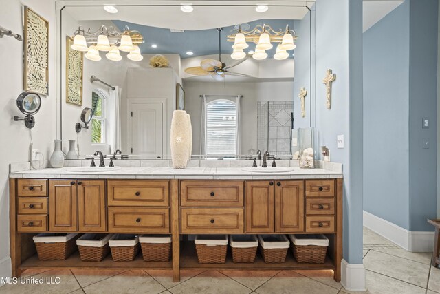 full bathroom featuring ceiling fan, double vanity, tile patterned floors, and tiled shower