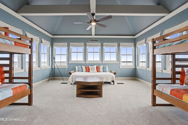 bedroom featuring carpet floors, multiple windows, and baseboards
