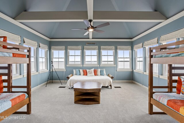 bedroom with carpet flooring, multiple windows, and baseboards