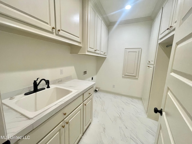 laundry room with hookup for an electric dryer, washer hookup, cabinets, ornamental molding, and sink