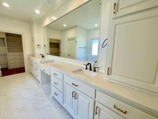 bathroom featuring vanity and crown molding