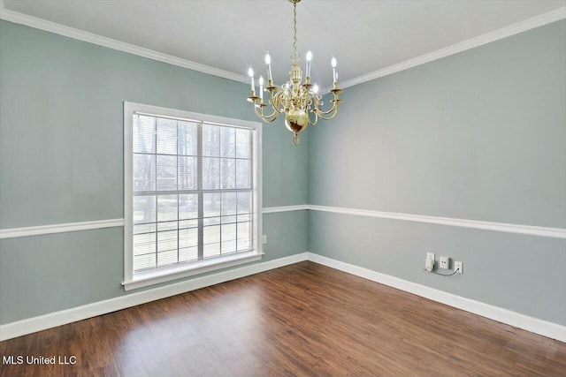 unfurnished room featuring ornamental molding, dark wood-style flooring, and baseboards