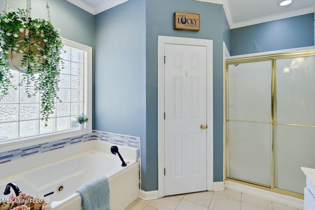 full bathroom with tile patterned flooring, baseboards, a bath, a stall shower, and crown molding