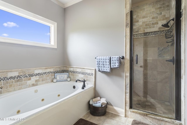 1600 Wright Rd, Raymond, MS 39154 - bathroom featuring a whirlpool tub, a shower stall, tile patterned floors, crown molding, and baseboards