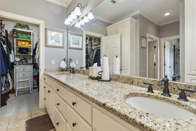 1600 Wright Rd, Raymond, MS 39154 - full bathroom with double vanity, a spacious closet, tile patterned flooring, ornamental molding, and recessed lighting
