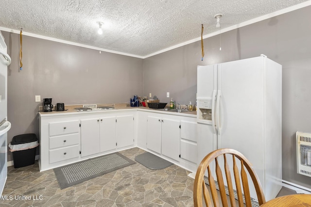 1600 Wright Rd, Raymond, MS 39154 - kitchen featuring white refrigerator with ice dispenser, heating unit, gas stovetop, a textured ceiling, and stone finish floors