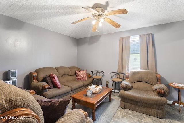 1600 Wright Rd, Raymond, MS 39154 - living area with ceiling fan, light stone finish floors, and a textured ceiling