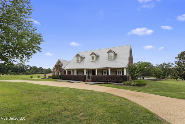 1600 Wright Rd, Raymond, MS 39154 - cape cod-style house featuring curved driveway, a front yard, metal roof, and a porch