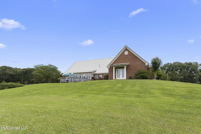 1600 Wright Rd, Raymond, MS 39154 - rear view of house with a yard, french doors, and brick siding