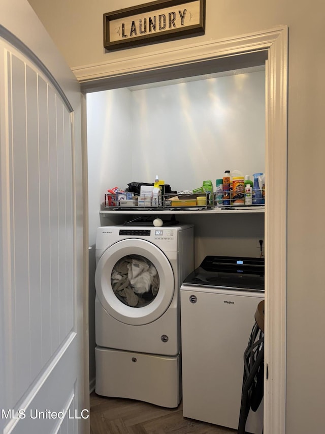 laundry area with laundry area and independent washer and dryer