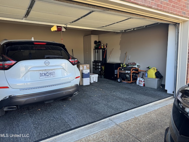 garage featuring a garage door opener