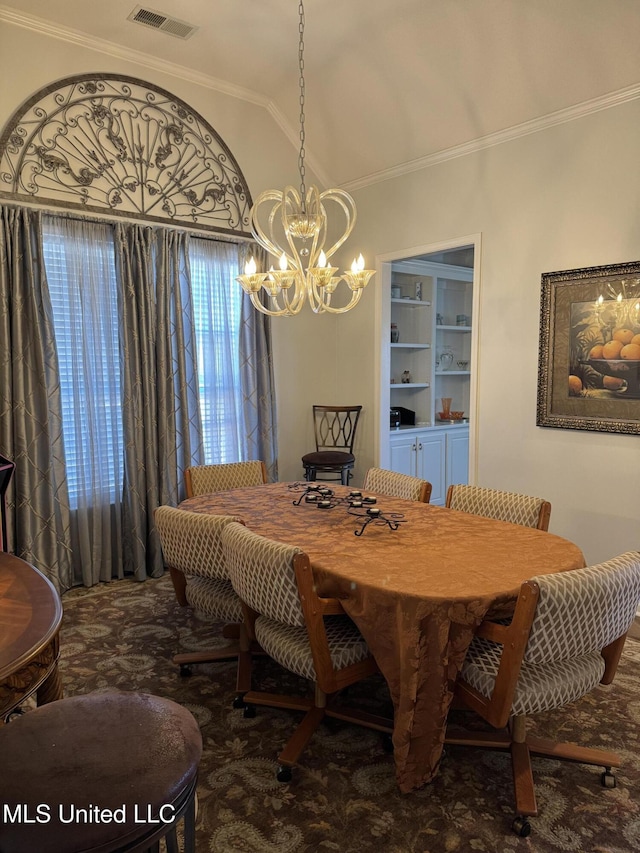 dining room with lofted ceiling, visible vents, a notable chandelier, and ornamental molding