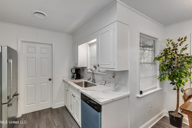 kitchen featuring dark wood-type flooring, sink, white cabinets, and stainless steel appliances