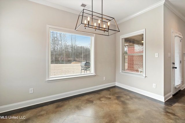 unfurnished dining area featuring concrete flooring, ornamental molding, plenty of natural light, and baseboards