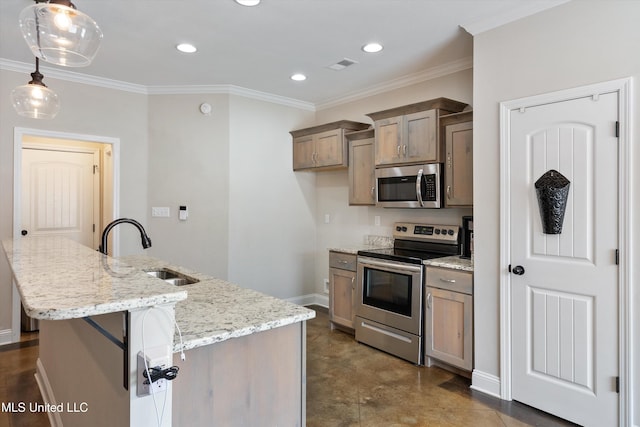 kitchen featuring appliances with stainless steel finishes, decorative light fixtures, sink, a kitchen island with sink, and light stone countertops