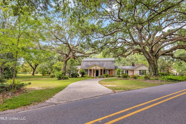 9618 Paige Bayou Rd, Vancleave, MS 39565 - view of front facade with a front yard and driveway