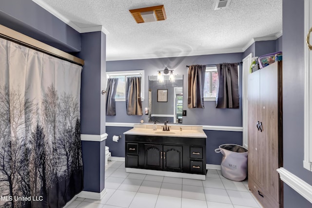 9618 Paige Bayou Rd, Vancleave, MS 39565 - full bath featuring vanity, a textured ceiling, baseboards, tile patterned floors, and crown molding