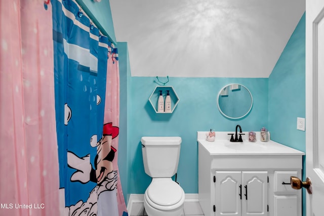 9618 Paige Bayou Rd, Vancleave, MS 39565 - full bathroom featuring toilet, lofted ceiling, vanity, a shower with curtain, and baseboards